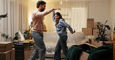 Buy stock photo Love, moving and couple dance in new home to celebrate dream house or property investment. Man, woman and music for relocation goal, mortgage success and excited with energy for real estate at night