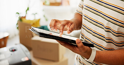 Buy stock photo Tablet, moving and hands of man in new home for research on renovations, interior design or online shopping. Digital technology, cardboard boxes and male person on app for ecommerce purchase in house