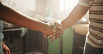 Agreement, handshake and painting with people in kitchen for deal, maintenance or renovation. Construction, real estate or thank you with homeowner and painter shaking hands for building or success