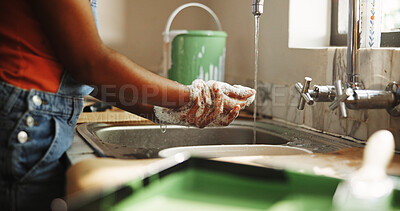 Buy stock photo Soap, faucet and woman washing hands in kitchen for painting with health, wellness or disinfectant. Water, renovation and person cleaning skin to remove bacteria, dirt or germs for home improvement.