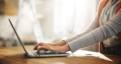 Buy stock photo Hands, laptop and typing with employee in home office for planning, remote work or research. Computer, small business and startup with freelance person at desk in study of apartment for report