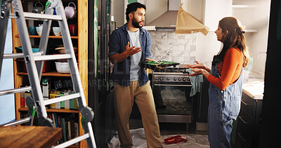 Buy stock photo Home improvement, argument and couple with paint, kitchen and fight for color of apartment or decor. Angry, black man and woman with conflict in new house, disagreement and discussion for remodeling