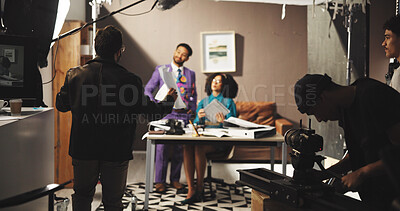 Buy stock photo Director, film and production with talent on set for casting, rehearsal or videography instructions. Acting, behind the scenes and recording with people in studio for direction, discussion or shoot