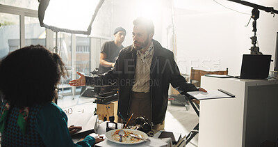 Buy stock photo Upset, director and talking to actor, set and annoyed by mistake on take, entertainment or creative. Frustrated, filmmaker and people with lines for movie, angry or instructions with script for scene