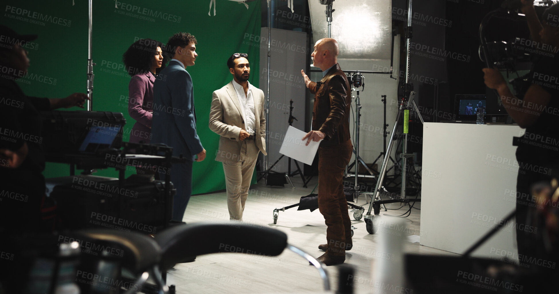 Buy stock photo Director, script and instruction to actor on set for creative guidance, cast direction and tips. People, filming team and producer with green screen for movie production, acting help and assistance
