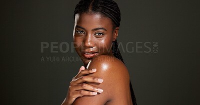 Buy stock photo Skincare, shoulder and portrait of black woman in studio for beauty, hydration and glow. Shine, aesthetic and dermatology with person on dark background space for  hygiene, clear skin and body care