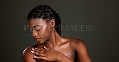 Buy stock photo Chest, beauty and hand of black woman in studio for skincare, hydration and glow. Shine, aesthetic and dermatology with person on dark background space for  hygiene, clear skin and body care