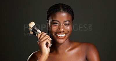 Buy stock photo Studio, happy and woman with makeup brush, portrait and equipment for beauty, makeover and selfcare. Gray background, black person and cosmetic for self expression, creative and tools for foundation