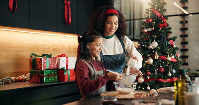 Buy stock photo Baking, mother and child with flour on Christmas for holiday cake recipe, dough preparation or help. Happy family, people and mix ingredients in home for xmas cookies, festive celebration or learning