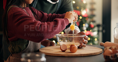 Buy stock photo Christmas, eggs and hands of child with parent in kitchen of home for festive tradition or help. Baking, holidays and bowl with family at apartment together for cooking or learning in December season