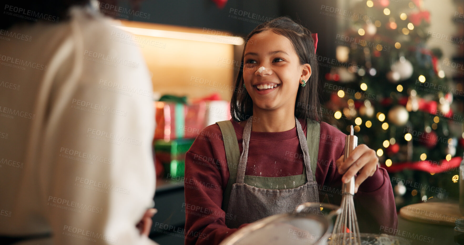 Buy stock photo Christmas, parent or girl baking with smile in kitchen for festive tradition, recipe or food. Learning, happy or female child in apartment for holiday celebration, cooking or xmas meal prep in home