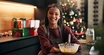 Christmas, portrait or happy kid baking with smile in kitchen for festive tradition, recipe or food. Learning, bowl or girl child in home for holiday celebration, cooking skills or xmas meal prep