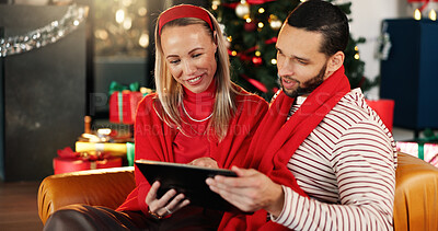 Buy stock photo Christmas, house and couple with tablet, love and search for gifts, holiday season and bonding together. Connection, festive and man with woman, tech and online entertainment with Xmas celebration