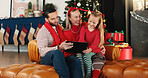 Home, happy family and laughing with tablet for Christmas film, gift shopping and festive cartoon. Tech, mother and father with child for xmas, funny movie and present choice with parents online