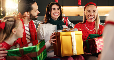 Buy stock photo Christmas, home and family with present, tradition and excited with love, celebrate together and giving. Group, surprise and Xmas with people, gifts and wow with happiness, holiday season or smile
