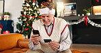 Senior man, phone and credit card at house for Christmas shopping, gift search and online payment. Smile, elderly person and mobile for ecommerce store, present checkout and transaction of xmas sales