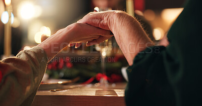 Buy stock photo Holding hands, Christmas and worship with family at dinner table for gratitude, holiday season and love. Prayer, spiritual and support with closeup of people in home for festive celebration and trust