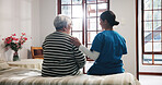 Back, talking and nurse with senior woman in bedroom for support, help and care in nursing home. Retirement, healthcare and caregiver with elderly person for empathy, conversation and consulting