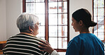 Empathy, shoulder and nurse with senior woman in bedroom for support, help or talking in nursing home. Retirement, health and back of caregiver with old person for comfort, conversation or consulting