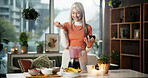 Smoothie, happy and mature woman with blender for healthy gut, benefits and wellness in kitchen. Home, diet and person with protein shake, breakfast juice and drink for digestion, nutrition and detox