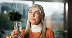 Thinking, senior woman and drinking water for health, nutrition or wellness in home. Glass, hydration and reflection with elderly person for detox, diet and daydreaming with vision in retirement