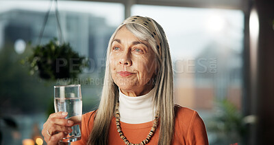 Buy stock photo Thinking, senior woman and drinking water for health, nutrition or wellness in home. Glass, hydration and reflection with elderly person for detox, diet and daydreaming with vision in retirement