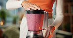 Person, hands and mixing fruit with blender for smoothie, milkshake or healthy diet in home. Closeup, nutritionist or vegan with mixer for natural organic drink, vitamins or fiber nutrition in house