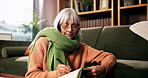 Senior woman, writing and journal on living room floor with reminder, notes and smile at retirement home. Person, book and happy for creativity, diary or relax with inspiration in lounge at apartment