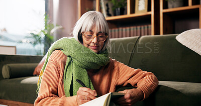 Buy stock photo Senior woman, writing and journal on living room floor with reminder, notes and smile at retirement home. Person, book and happy for creativity, diary or relax with inspiration in lounge at apartment