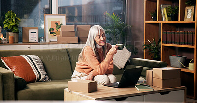 Buy stock photo Reading, laptop and coffee with old woman on sofa for retirement policy, planning and review. Insurance payout, pension benefits and online application with elderly person in living room of home