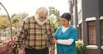 Walking, nurse and support with old man for healthcare, occupational therapy and help. Kindness, rehabilitation and medical advice with person with a disability in nursing home for trust and caregiver