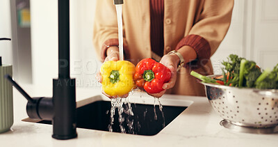 Buy stock photo Water, hands and woman in kitchen, vegetables and cleaning with nutrition, washing and wellness. Vegan, home and person with natural ingredients, healthy and bell pepper for food hygiene and cooking