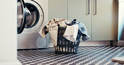 Buy stock photo Laundry, washing machine and clothes in basket in home for housekeeping, fresh linen and hygiene. Empty, apartment and appliance with clean fabric for domestic chores, sanitation or housework routine