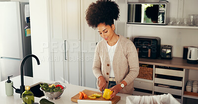 Buy stock photo Happy, woman and cooking in kitchen, meal prep and chopping vegetables for dinner or tips on tablet. Nutrition, process and African person with tech for recipe, ingredients or culinary skills in home