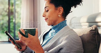 Buy stock photo Woman, coffee and scroll with phone in home for reading online news, streaming service or ebook. Relax, person and smile with smartphone for social media post, caffeine break and browsing dating site