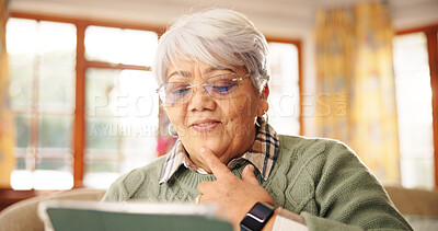 Buy stock photo Thinking, old woman and watching movie with tablet, streaming and relax in home with website or app. Happy, senior person and entertainment with tech in house, reflection or online for film in lounge