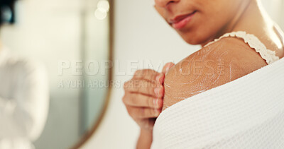 Buy stock photo Hand, lotion and skincare for shoulder, bathroom or moisturizer for natural glow or morning routine in home. Person, cream or product for self care, cosmetics and benefits with collagen at apartment