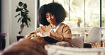 Happy woman, sofa and writing with book in home for journalism, diary or copywriting. Female person, writer or journalist taking notes with notebook for storytelling, chapter or schedule reminder