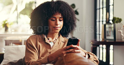Buy stock photo Woman, relax and phone on sofa for social media, connectivity and text message in home. African girl, mobile and typing in living room for research, status update and forum discussion on internet