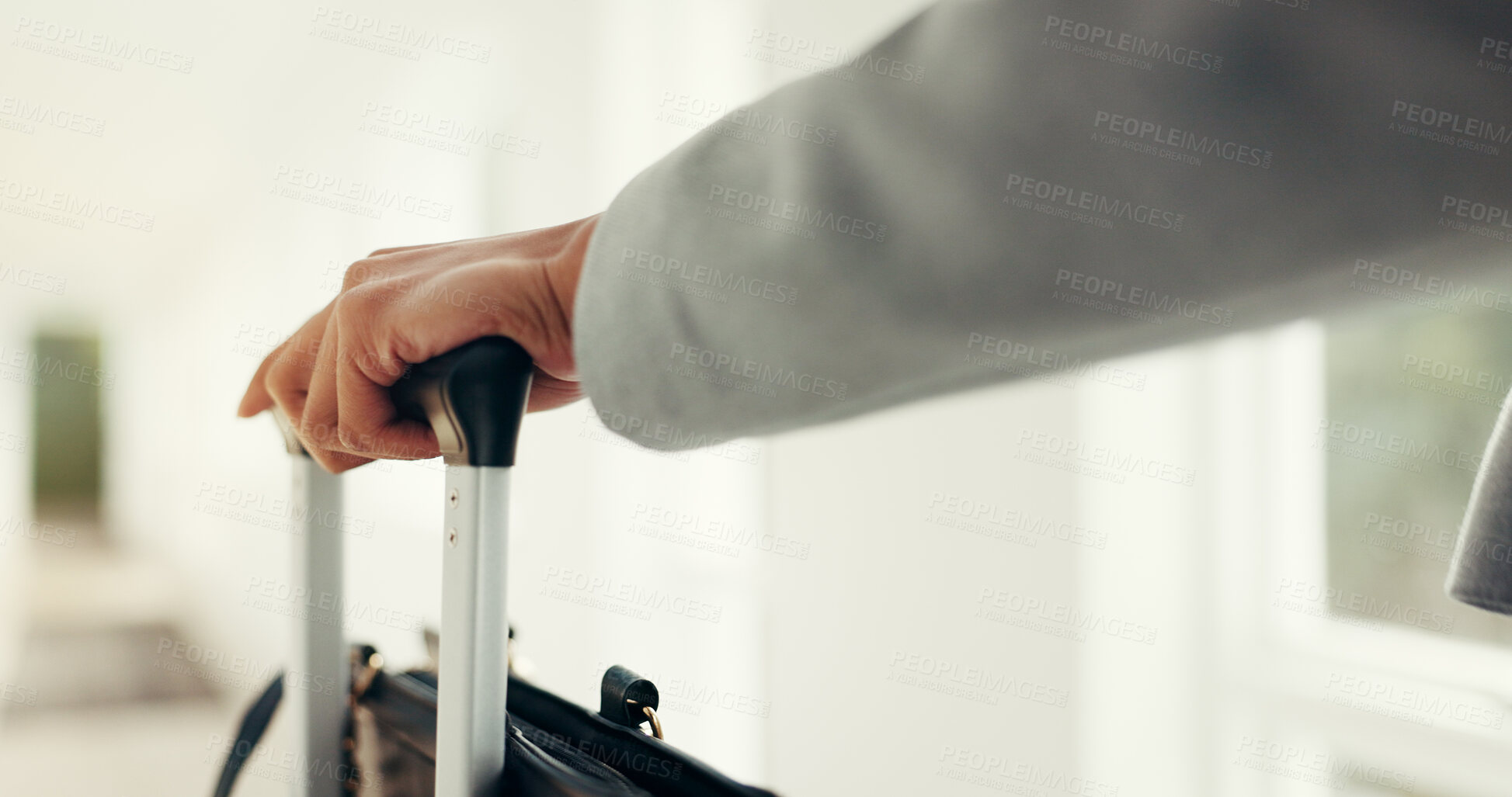 Buy stock photo Hands, luggage and business person in hotel lobby for travel, immigration and international convention. Corporate employee, baggage and suitcase for tourism trip in corridor at accommodation lodge
