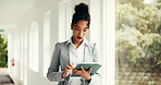 Business, woman and reading on tablet in lobby for research, email client and selling property. Female realtor, digital or web for real estate sales, review information and schedule viewing of rental