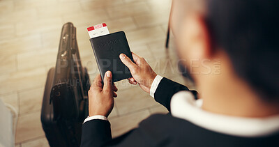 Buy stock photo Businessman, hands and passport with luggage above for travel, commute or boarding pass. Top view, male person or traveler with identity document, bags or flight ticket for information or direction