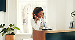 Headphones, woman and hotel receptionist with music, playlist or online radio on break. Happy, audio tech and female concierge listening to album for entertainment at front desk at accommodation.