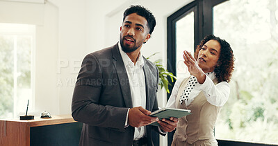Buy stock photo Concierge, advice and tablet with businessman in hotel for  check in assistance, reservation and discussion. Help desk, information and reception with people in lobby for guest and hospitality