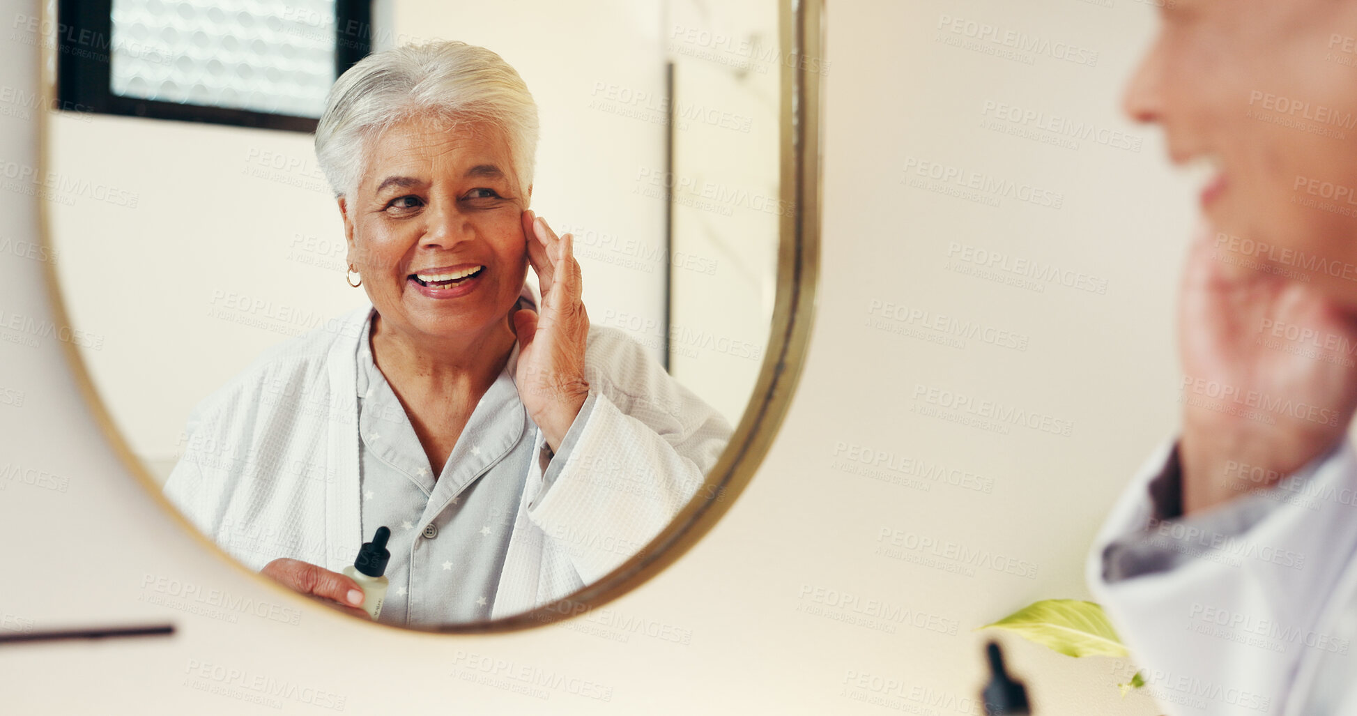 Buy stock photo Serum, skincare and mirror with old woman in bathroom for beauty, anti aging and cosmetics. Collagen treatment, facial product and dermatology with elderly person in home for glow and self care