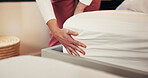 Hands, cleaning and nurse making bed for housekeeping, hospitality or maintenance at home. Chores, person and change sheets in bedroom for daily routine, tidy and hygiene with caregiver for health
