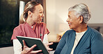 Smile, nurse and tablet with senior woman for good news, medical report and diagnosis results. Digital, caregiver and elderly person for consultation, insurance cover and treatment progress at house