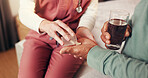 Nurse, help  and pills with hands of old person in bedroom for medicine, treatment and support. Medical, drink and healthcare with caregiver and patient in nursing home for retirement and vitamins