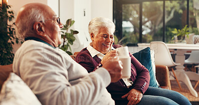 Buy stock photo Coffee, laugh and senior couple on sofa in home with conversation, bonding or relax together. Happy, cappuccino and elderly man with woman for retirement in living room for calm morning in house.