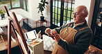 Senior man, artist and picture with phone of canvas in home for creative art, memory or post. Elderly, male person or Picasso with mobile smartphone for photography or capture moment of painting